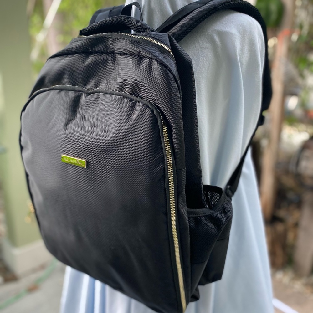 NEVER USED/no tags- Black multi pocket backpack w/ gold- unisex- padded straps